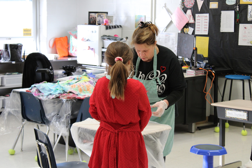 Donna Scuorzo helping a student
