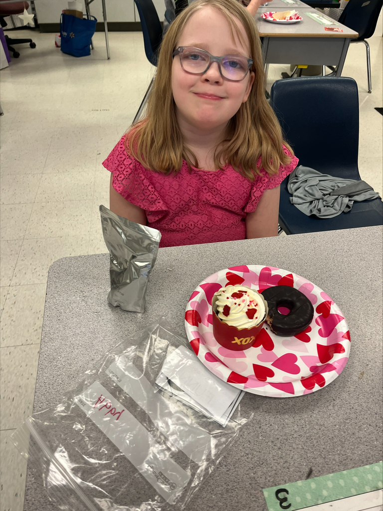 Student with Valentine's Day plate