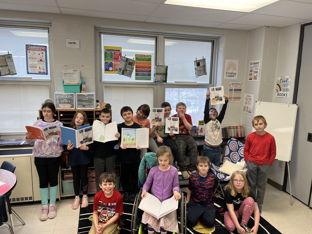 Afton students with their books in Ms. Loesch's class.
